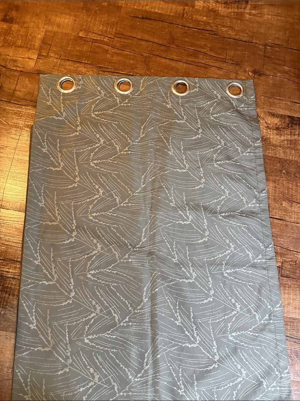 Grommet Top Decorative Curtain Panel in Sage with Subtle Leaf Pattern
